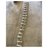 70in line of steel wire bar supports, possibly