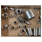 Variety of threaded metal pipe couplings or metal