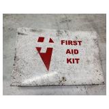 Hanging metal first aid kit w/variety of items,
