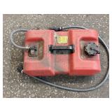 Red portable marine fuel tank w/gray fuel hose,