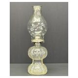 Clear glass oil lamp, double tiered base,