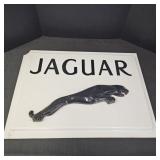 White Plastic Jaguar Emblem Sign