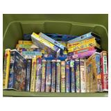 Variety of childrenï¿½s VHS tapes in Rubbermaid tote