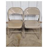 (2) Beige Metal Folding Chairs