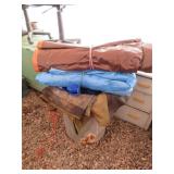 Metal Garbage Can Full of Tarps