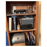 3 shelves of office supplies *