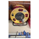 EXTENSION CORD AND REEL