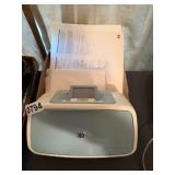 HP photosmart A522 printer, books, paper