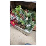 Tote of wreaths and hangers