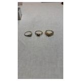 Three 10 karat gold rings stones removed