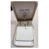 14 karat gold, diamond pendant necklace with