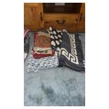 PILE OF THROW RUGS