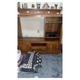 ENTERTAINMENT CENTER AND MAGNAVOX VHS PLAYER
