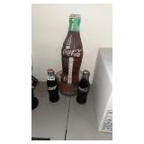 4 coke advertising pieces
