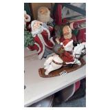 THREE HANDCRAFTED SANTAS