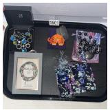 4 necklaces and a bracelet