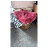 basket of three throw blankets