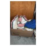 box of crotchet blankets and pillow