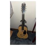 Guitar with stand