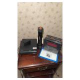 Dvd player, clock radio and flashlight