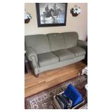 Clean Sofa w/ wooden legs and brass trim