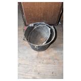2 CAST IRON BUCKETS