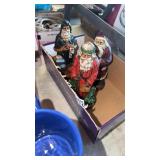 THREE WOODEN SANTAS