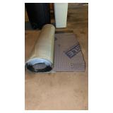 Partial roll of snow and ice shield