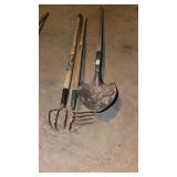 Two potato rakes and a round point shovel