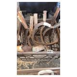Crate of scythes