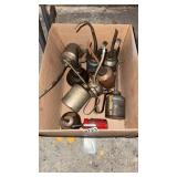 Box of oil cans