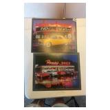 Two metal signs