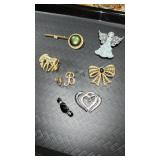 9 misc pins / brooches