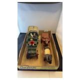 2 cast iron buggies