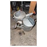 3 metal water cans