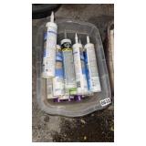 2 totes of new and used caulk
