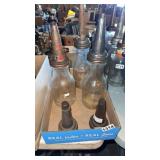 Three oil bottles, two extra spouts