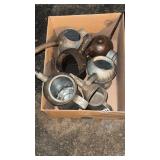 Box of oil cans