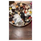 Containers of buttons