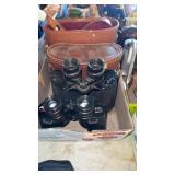 Two pairs of binoculars with leather cases