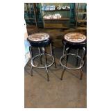 Two barstools the  busted knuckle garage
