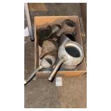 Box of oil cans