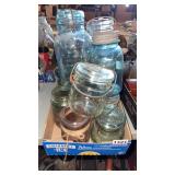 Glass canning jars, some with lids marbles, etc.