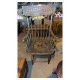 Early wooden potty chair with press back