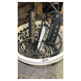 Basket of extension cords power strips