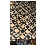Black and white lap quilt tied