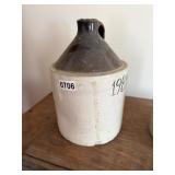 BROWN AND WHITE STONEWARE JUG