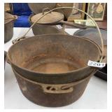 TWO CAST IRON DUTCH OVENS - NO LIDS