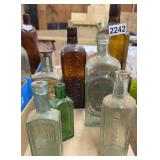7 VINTAGE GLASS ADVERTISING BOTTLES