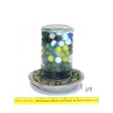 Group of Marbles in Vintage Chicken Waterer